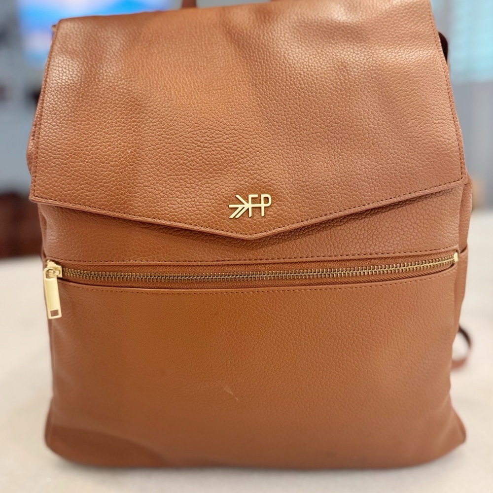 Brown Leather Backpack with Gold Accents
